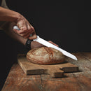 PAUL BROWN Classic 10 Inch X50CrMov15 Bread Knife with Soft Touch White Handle